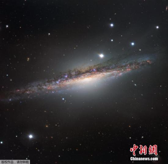 资料图：鲸鱼座NGC1055星系