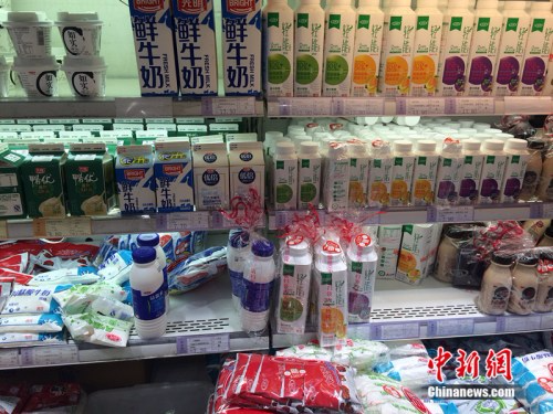 资料图：北京市一家超市销售的牛奶。<span target='_blank' href='http://www.chinanews.com/' ></div>中新网</span> 邱宇 摄