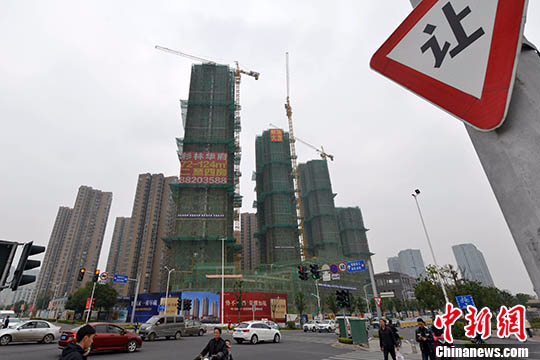 资料图 1月10日，福州一处商品房在建中。 <span target='_blank' href='http://www.chinanews.com/'></div>中新社</span>记者 吕明 摄