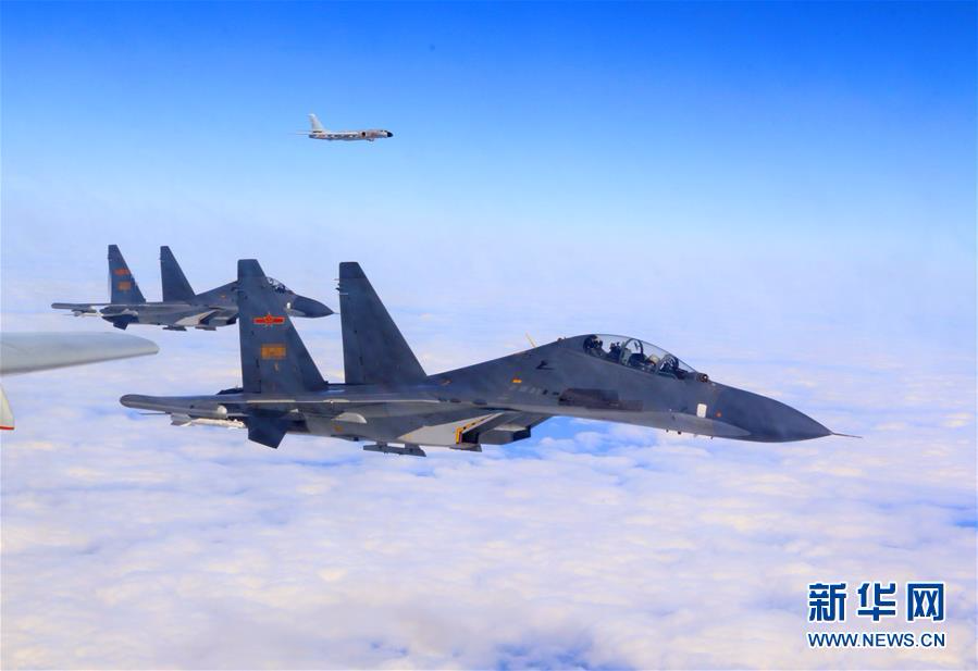 （图文互动）（6）中国空军多架轰－6K战机展翅远洋战巡南海