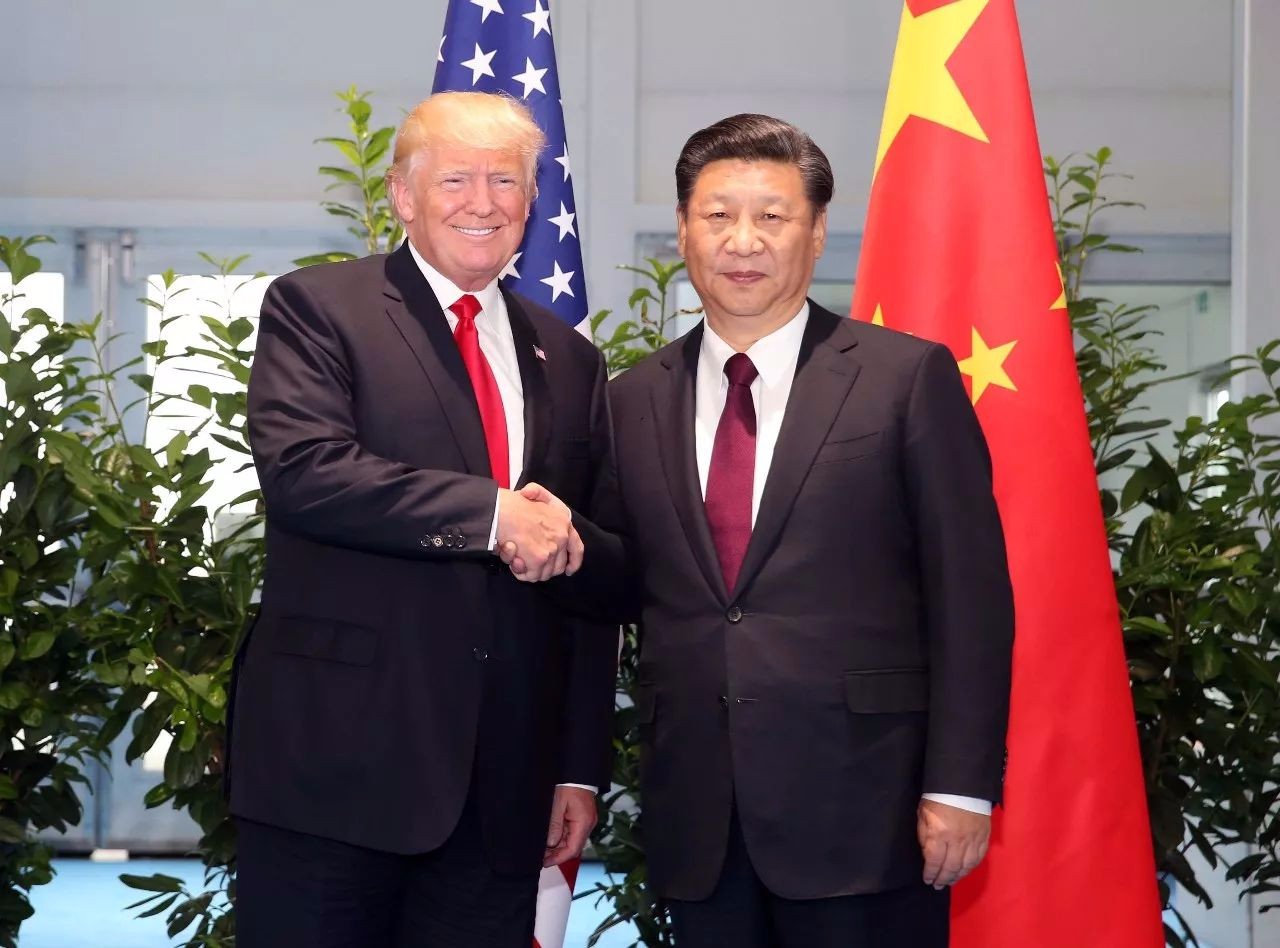 习近平与特朗普进行会晤 中美元首同意重启两国经贸磋商-国际在线